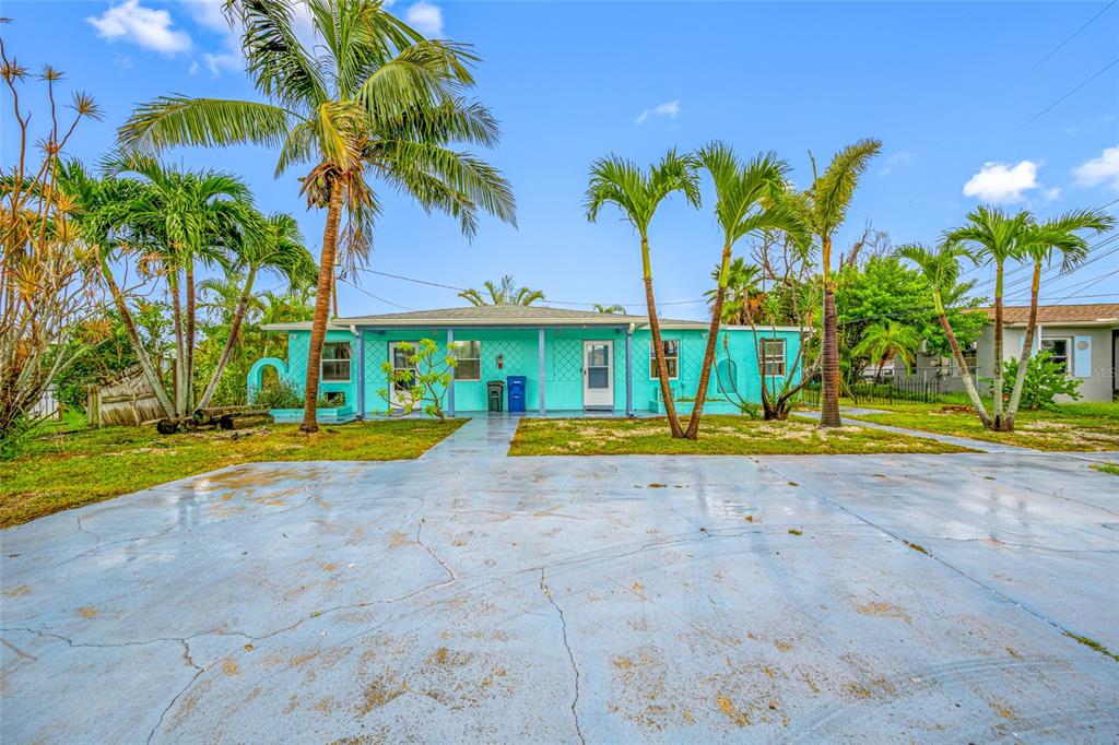 14111 West Parsley Drive Madeira Beach, FL 33708 - Photo 4 of 99 a view of a volley ball court