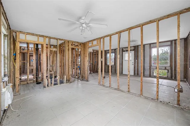 a bedroom with a bed and a view of bathroom