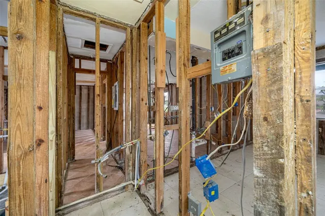 a bathroom with a toilet and a shower curtain