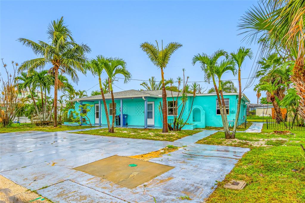 14111 West Parsley Drive Madeira Beach, FL 33708 - Photo 7 of 99 a view of a volley ball court