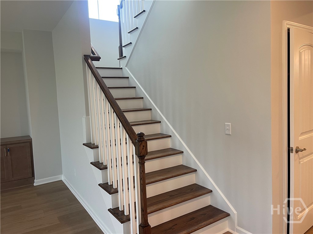 185 Champlain Drive Pooler, GA 31322 - Photo 9 of 26 Hand Stained Wood Stairs