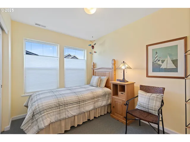 a bedroom with a bed and a closet