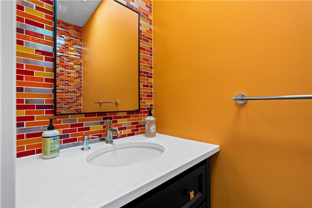 1506 Pleasant View Road Coopersburg, PA 18036 - Photo 62 of 97 A vibrant backsplash accents this functional bathroom vanity, offering both style and utility.
