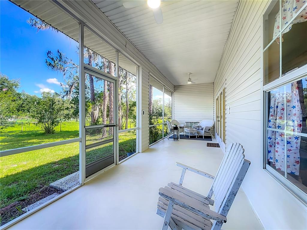 10222 Rockridge Road Lakeland, FL 33810 - Photo 30 of 39 a view of an house with outdoor space and balcony