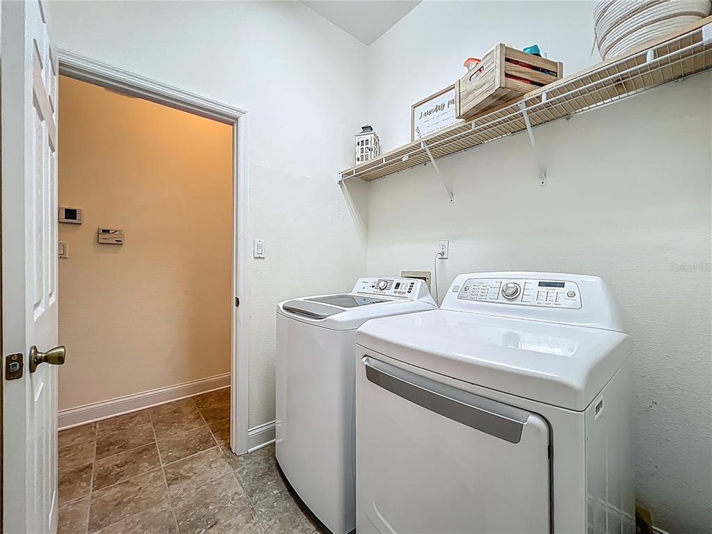 10222 Rockridge Road Lakeland, FL 33810 - Photo 32 of 39 a utility room with dryer and washer