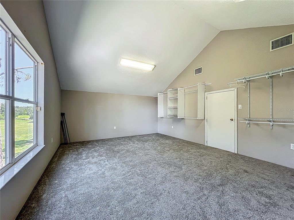 10222 Rockridge Road Lakeland, FL 33810 - Photo 37 of 39 en empty room with windows and pillars in it