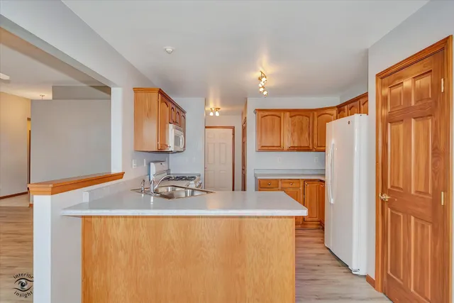 a bathroom with a double vanity sink and mirror