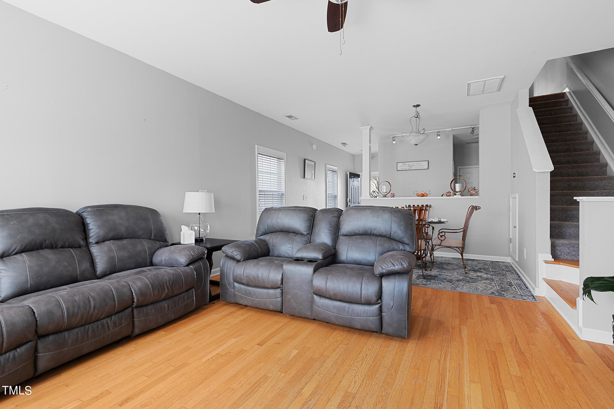 5324 Eagle Trace Drive Raleigh, NC 27604 - Photo 11 of 26 a living room with furniture and a wooden floor