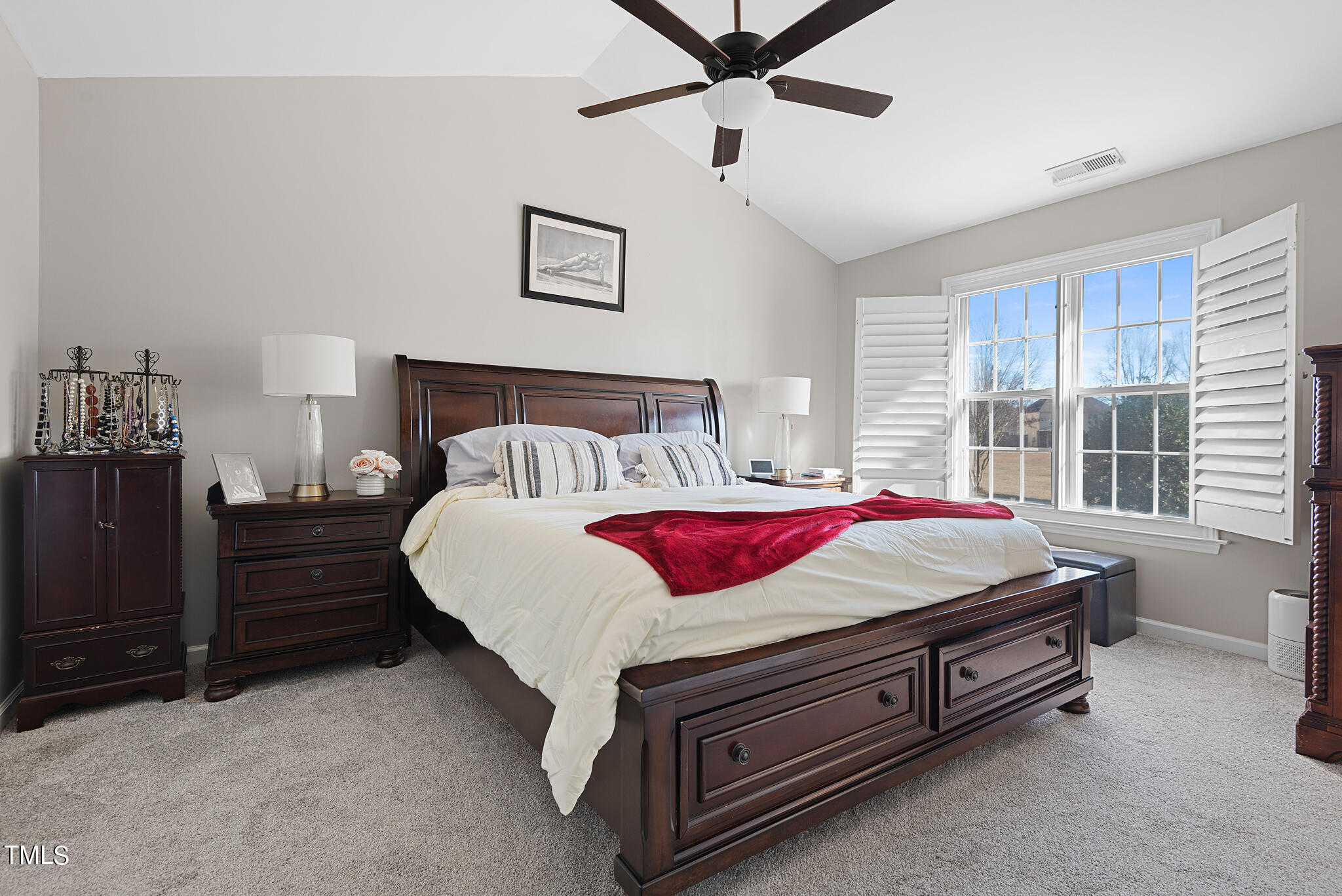 5324 Eagle Trace Drive Raleigh, NC 27604 - Photo 12 of 26 a bed sitting in a bedroom next to a window