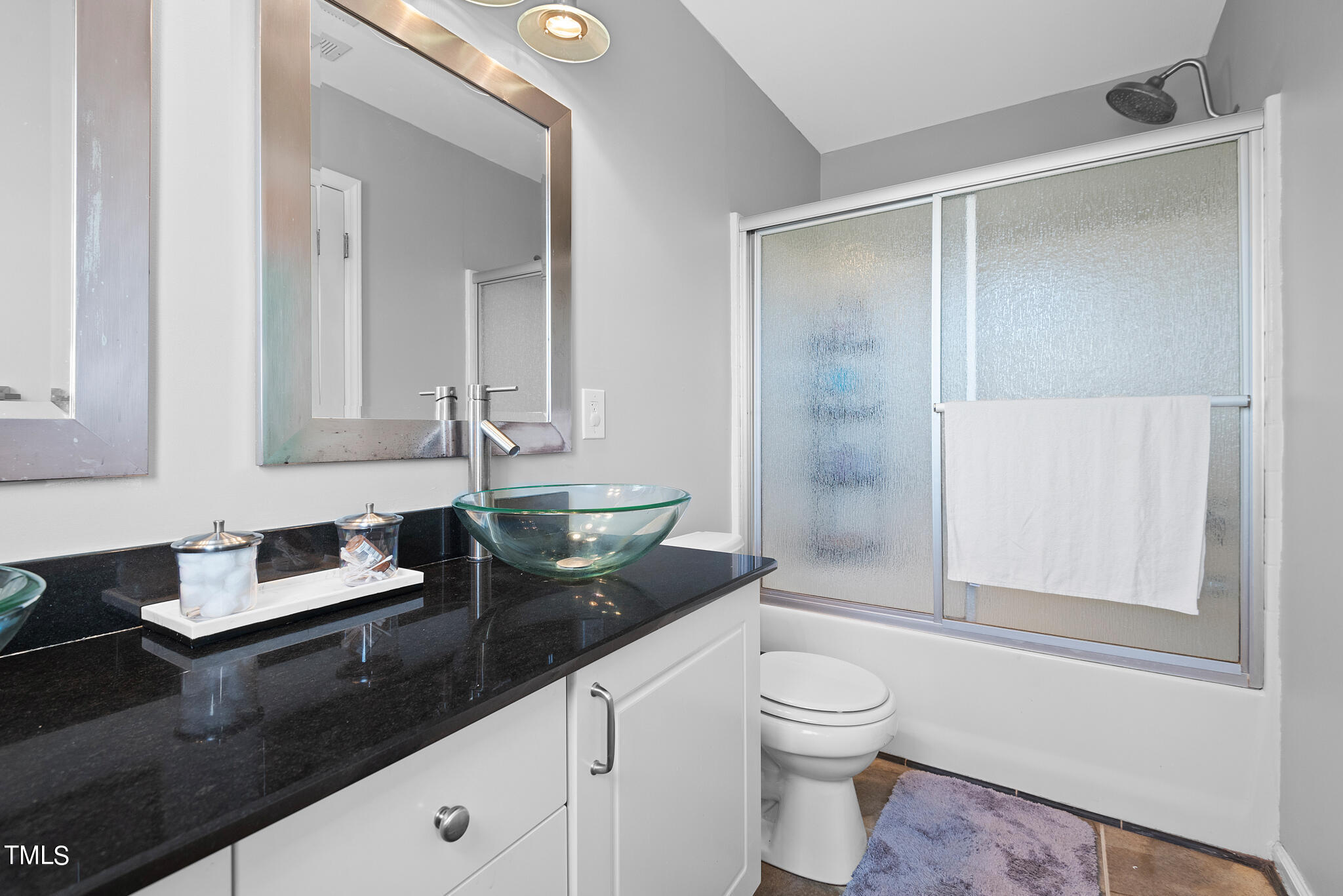 5324 Eagle Trace Drive Raleigh, NC 27604 - Photo 15 of 26 a bathroom with a granite countertop sink toilet a mirror and shower