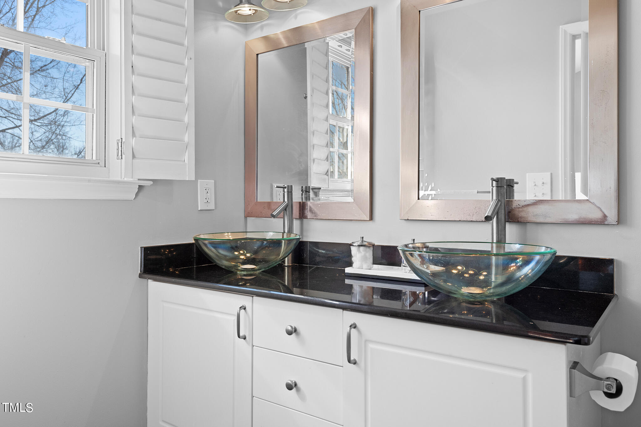 5324 Eagle Trace Drive Raleigh, NC 27604 - Photo 16 of 26 a kitchen with granite countertop a sink and a white cabinets