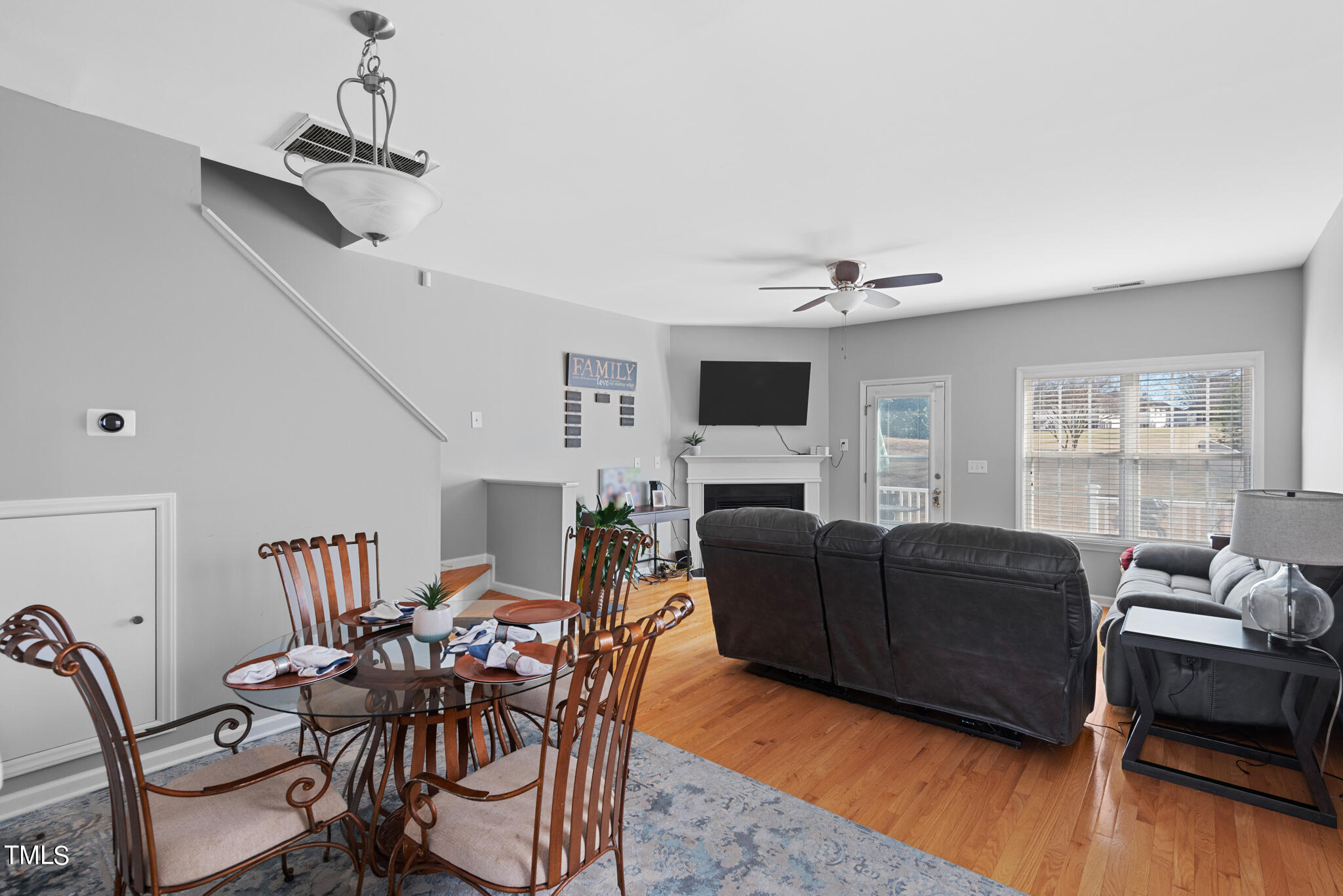 5324 Eagle Trace Drive Raleigh, NC 27604 - Photo 9 of 26 a living room with furniture and a wooden floor
