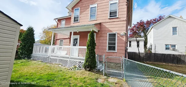 a view of a house with a balcony