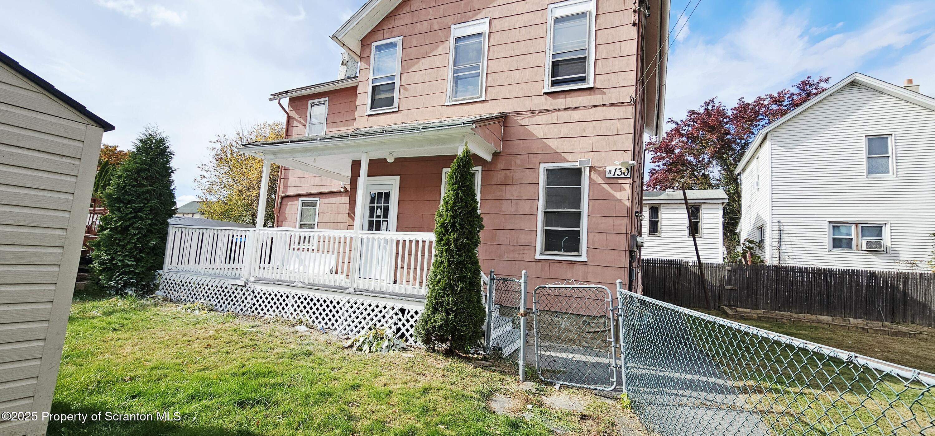 a view of a house with a balcony