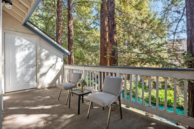 a view of a two chair in the balcony
