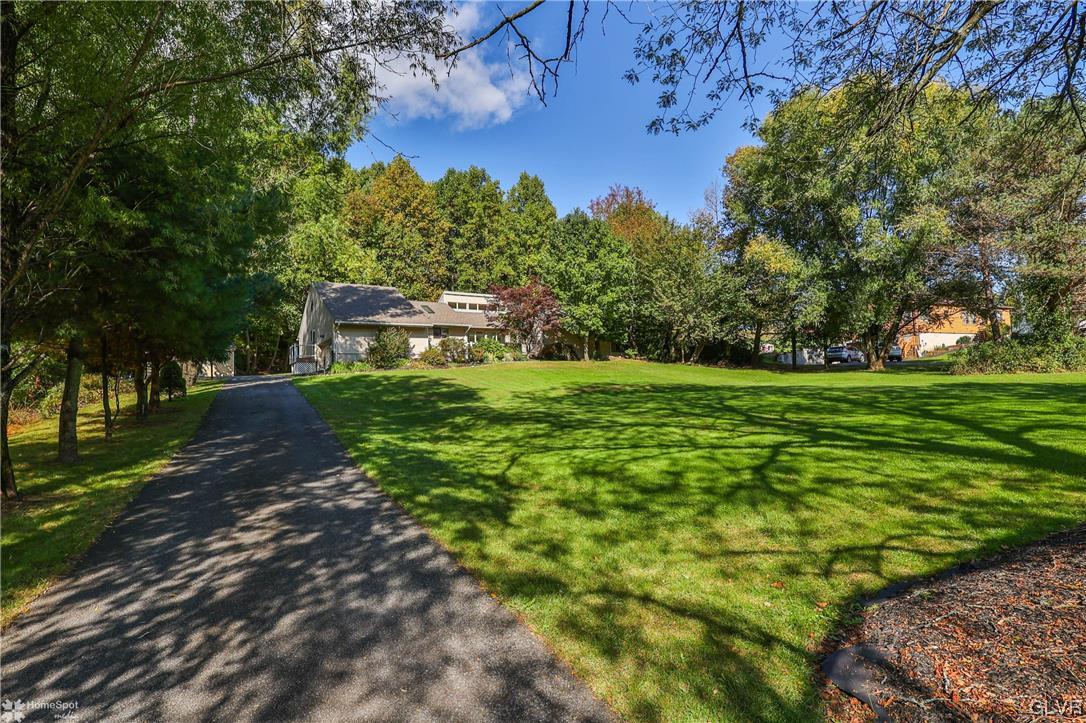4175 Sherry Hill Road Hellertown, PA 18055 - Photo 1 of 50 a backyard of a house with lots of green space