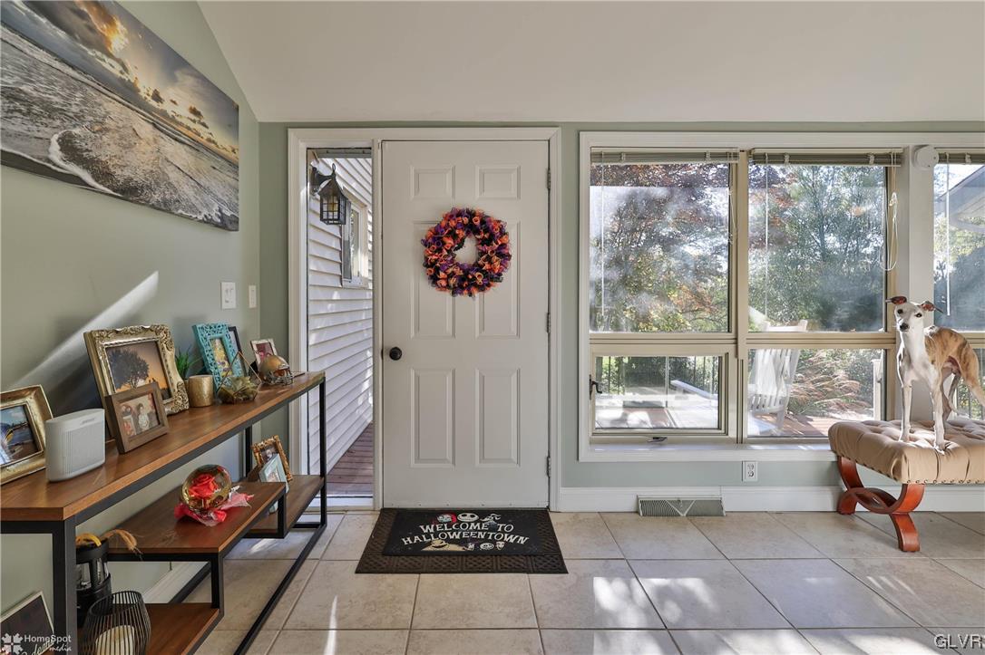 4175 Sherry Hill Road Hellertown, PA 18055 - Photo 11 of 50 a living room with furniture and a floor to ceiling window