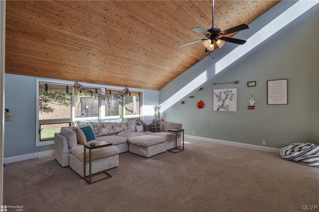 4175 Sherry Hill Road Hellertown, PA 18055 - Photo 22 of 50 a living room with furniture and a window