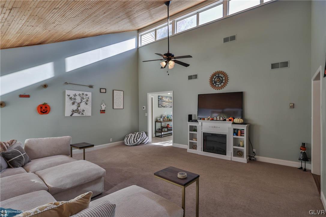 4175 Sherry Hill Road Hellertown, PA 18055 - Photo 23 of 50 a living room with furniture and a flat screen tv