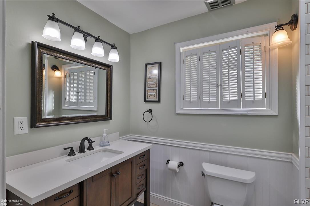 4175 Sherry Hill Road Hellertown, PA 18055 - Photo 32 of 50 a bathroom with a sink a vanity and a mirror