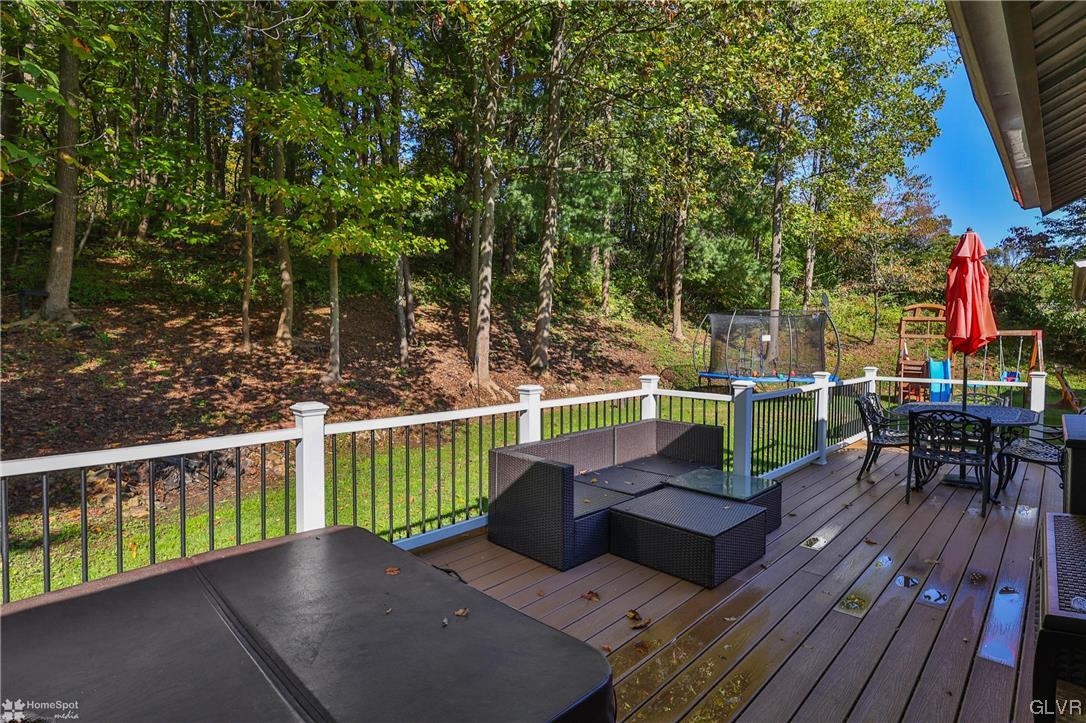 4175 Sherry Hill Road Hellertown, PA 18055 - Photo 48 of 50 a view of a patio with chairs next to a yard