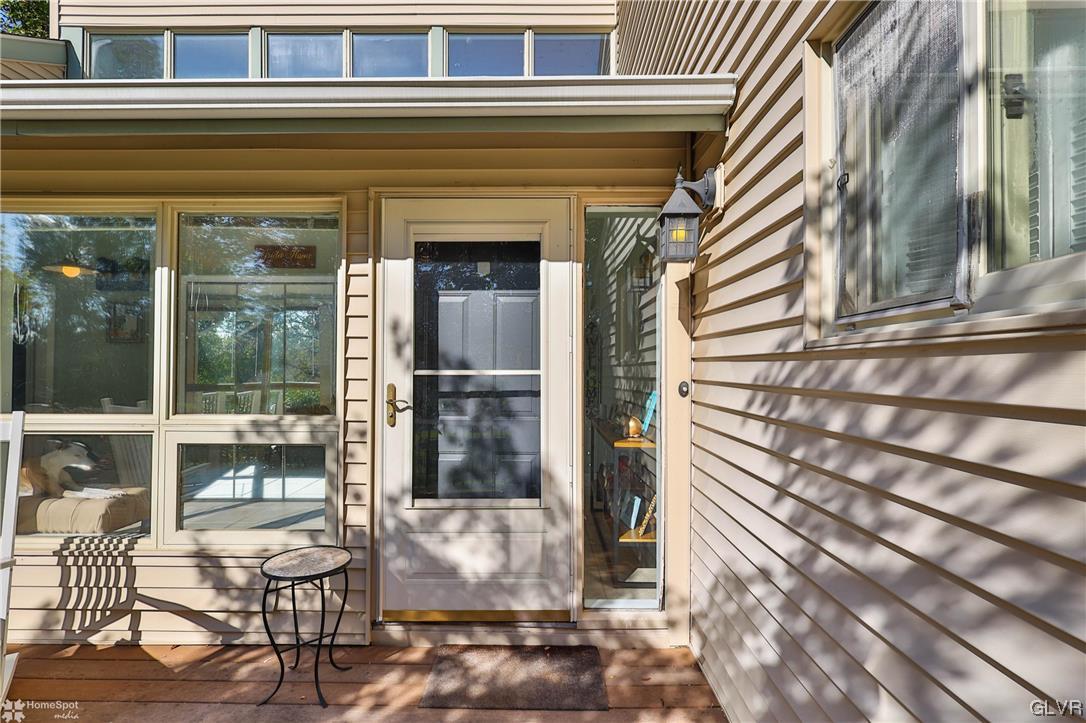 4175 Sherry Hill Road Hellertown, PA 18055 - Photo 10 of 50 a view of a porch with a door and a glass door