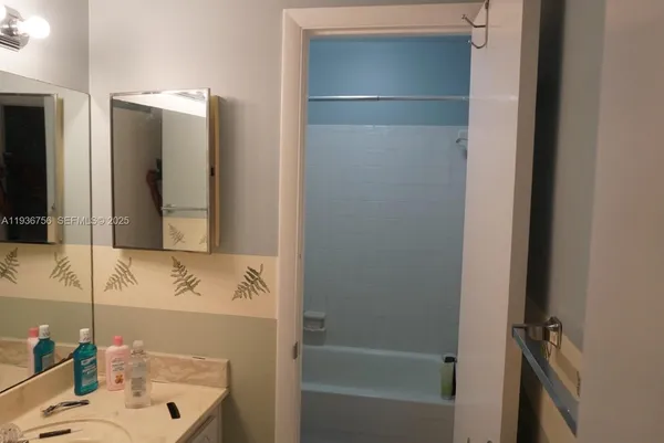 a bathroom with a sink and toilet