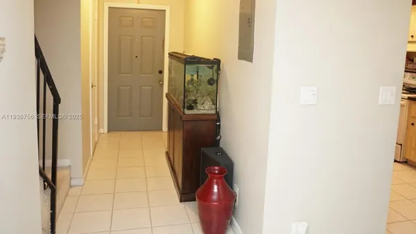 a view of a dining room with furniture and window