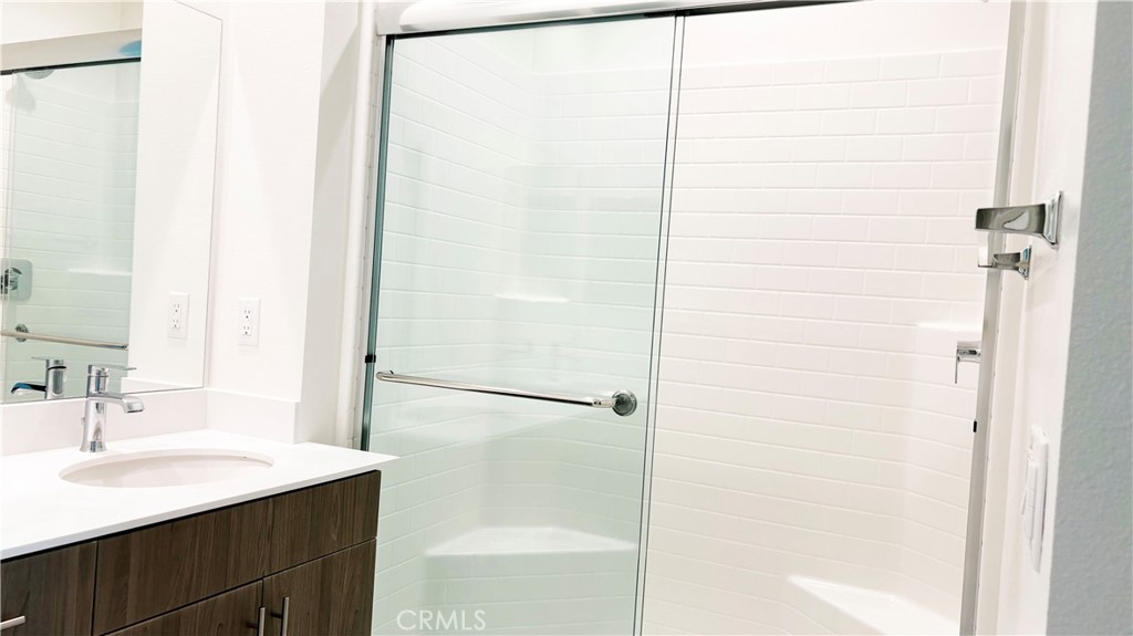 6972 Sagebrush Circle Buena Park, CA 90621 - Photo 4 of 7 a bathroom with a sink and a mirror