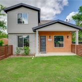 a view of front of a house with a yard