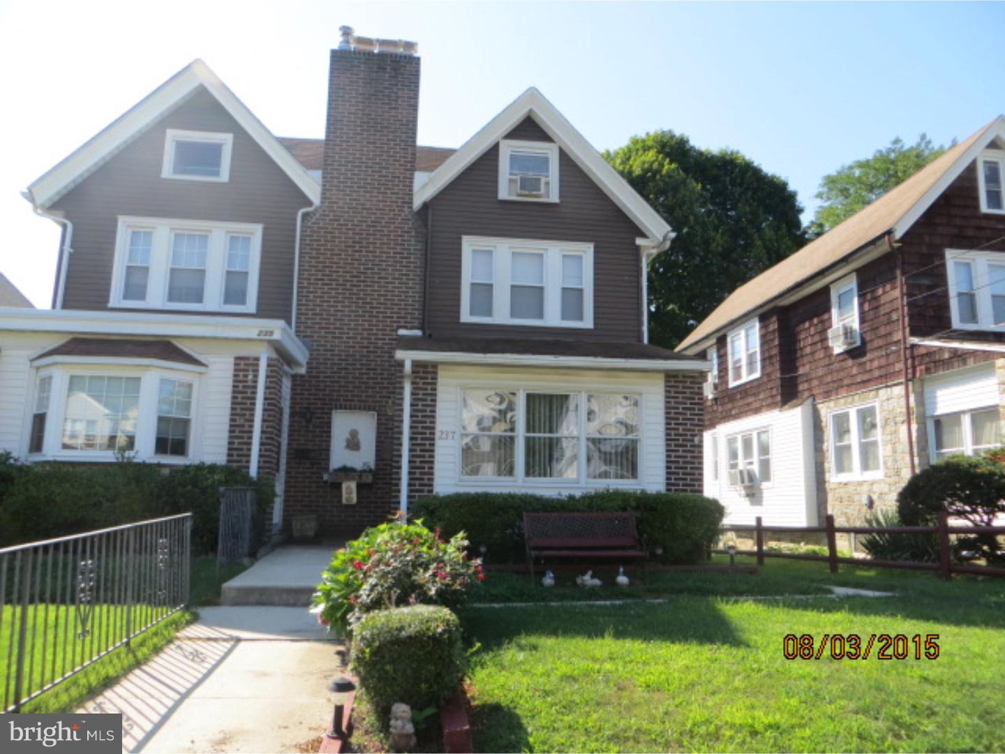 237 Powell Road Springfield, PA 19064 - Photo 1 of 25 a front view of a house with a garden and plants