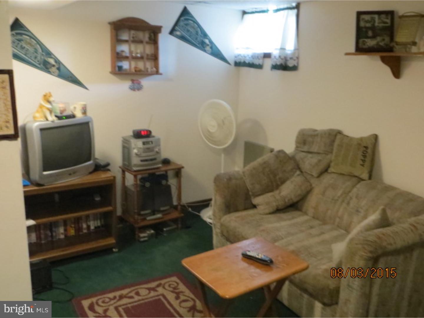 237 Powell Road Springfield, PA 19064 - Photo 12 of 25 a living room with furniture and a flat screen tv