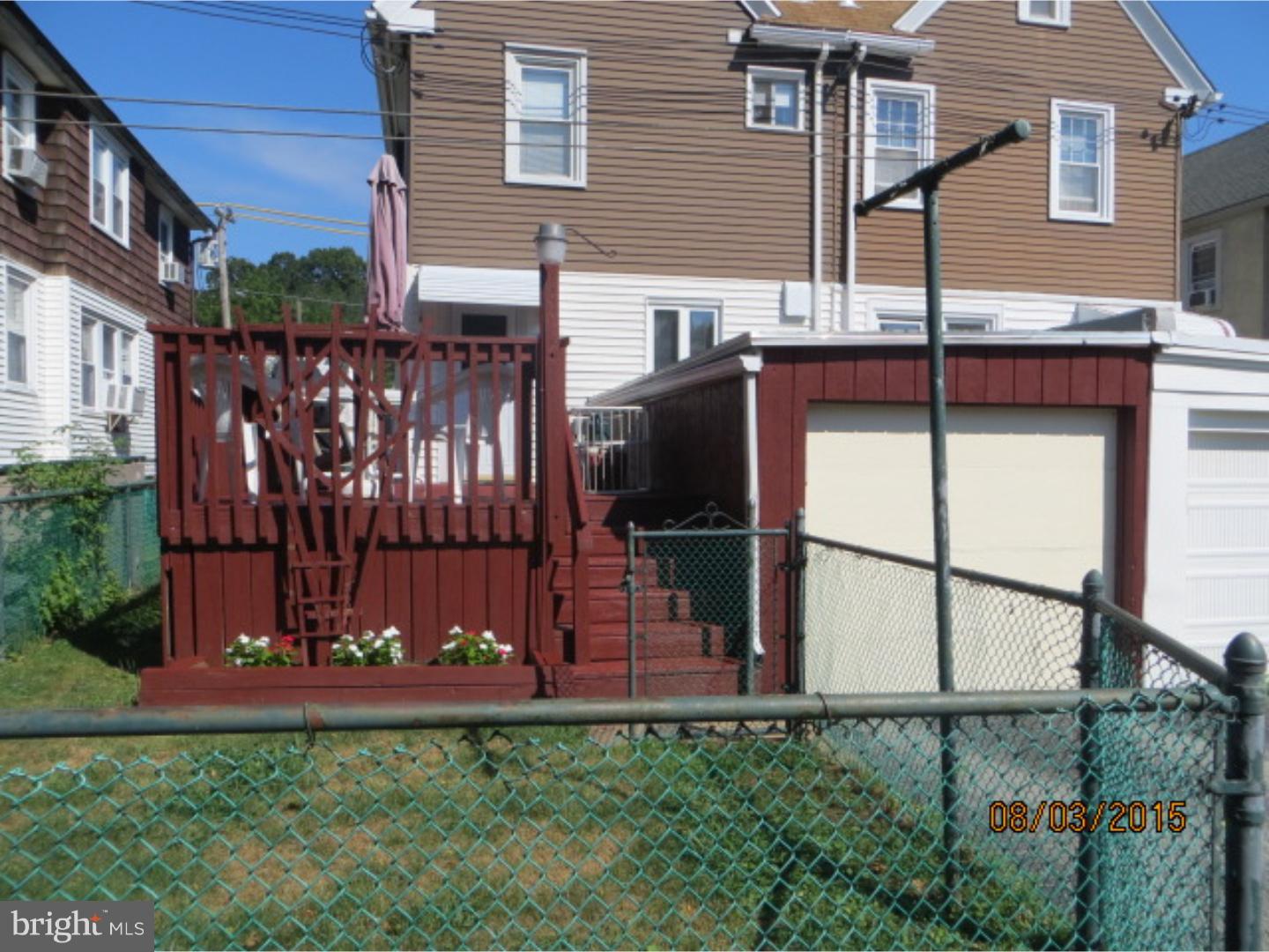 237 Powell Road Springfield, PA 19064 - Photo 23 of 25 front view of a house with a fence