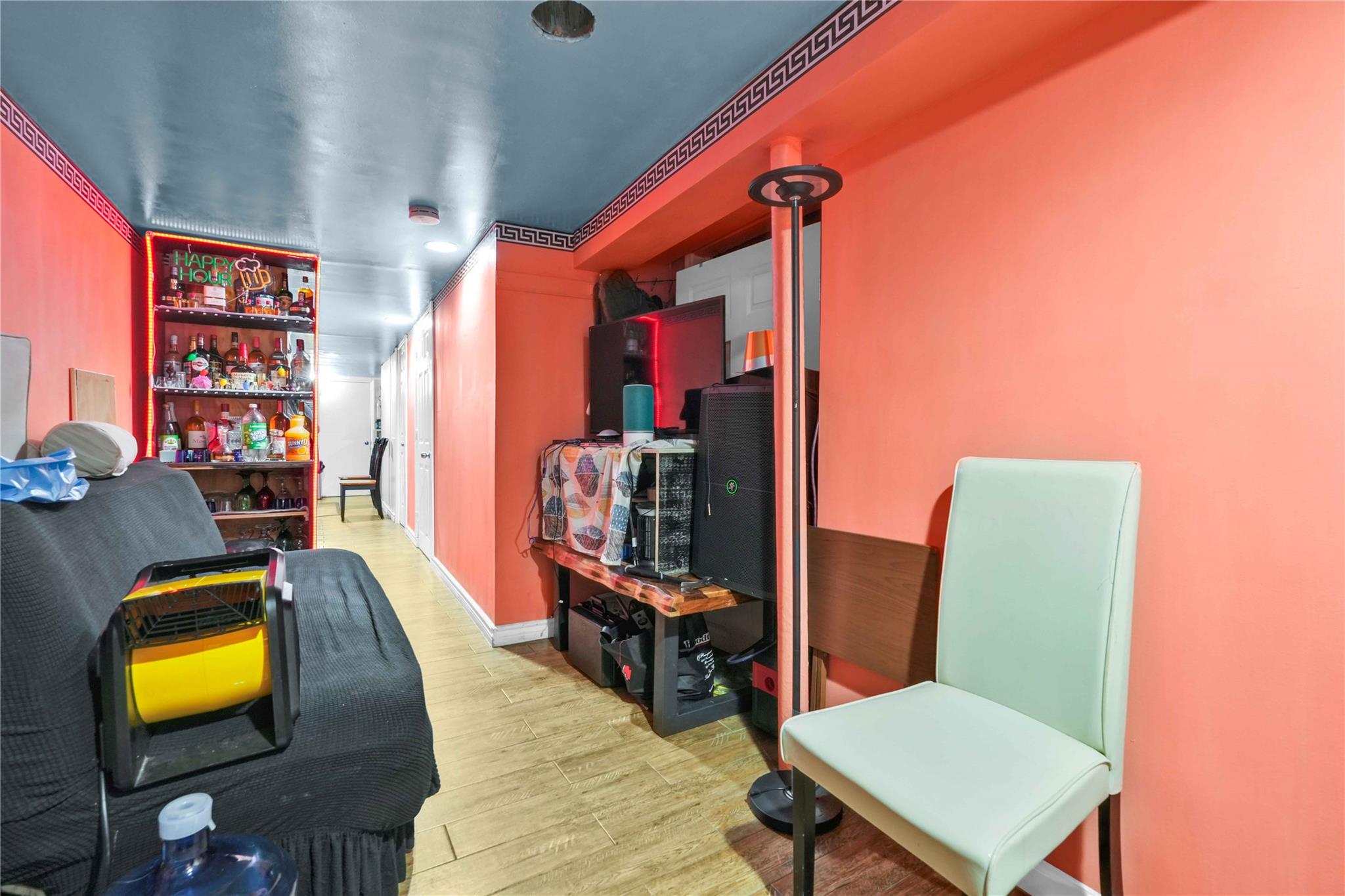 109-55 Lefferts Boulevard Queens, NY 11420 - Photo 19 of 21 a living room with furniture wall and a flat screen tv