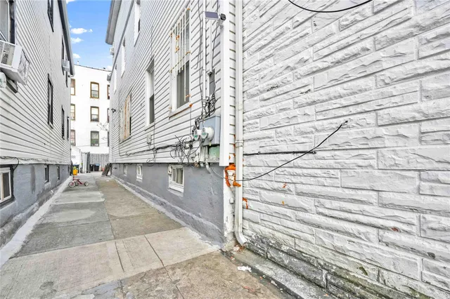 a view of a pathway both side of building