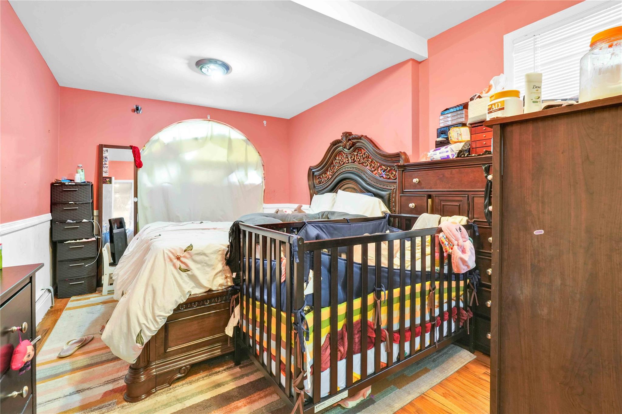 109-55 Lefferts Boulevard Queens, NY 11420 - Photo 10 of 21 a view of a balcony with furniture and wooden floor