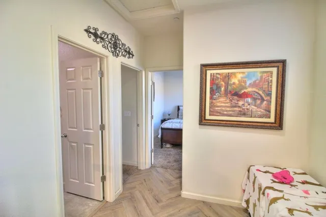 a view of a hallway with workspace