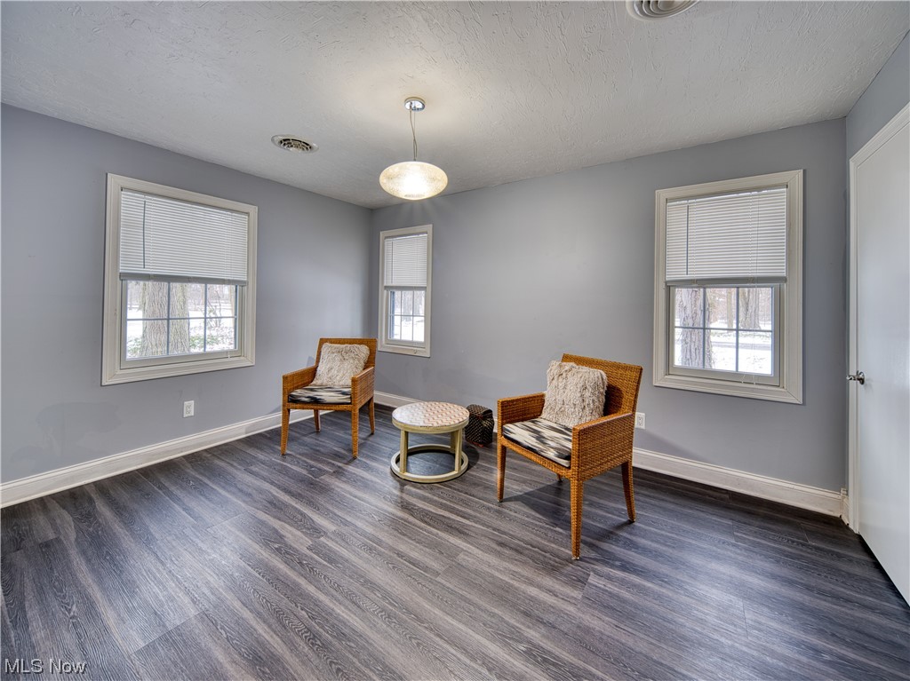 32199 Cedar Road Cleveland, OH 44124 - Photo 22 of 31 Sitting room with dark hardwood / wood-style floors, a textured ceiling, and plenty of natural light