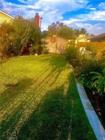 a view of swimming pool with an outdoor space and seating area