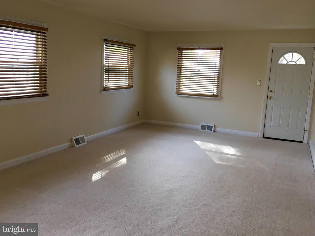 1206 3rd Road Middle River, MD 21220 - Photo 5 of 19 a view of an empty room with a window