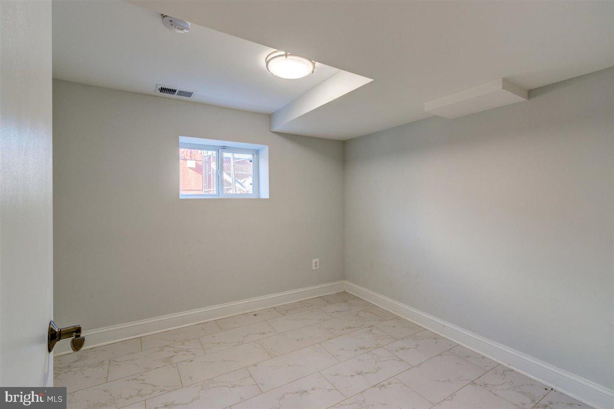 1316 Ridge Place Southeast Washington, DC 20020 - Photo 25 of 28 Basement Bedroom