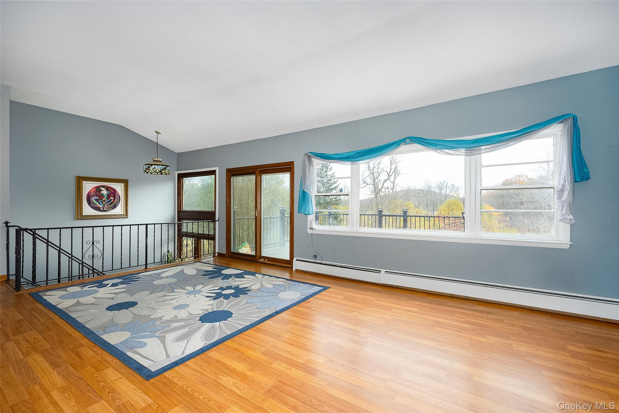 21 North Gate Road Carmel, NY 10512 - Photo 13 of 31 a view of a big room with wooden floor and windows