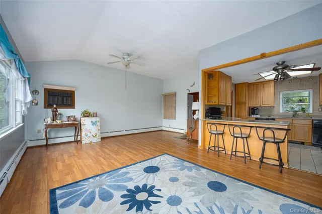 a kitchen with stainless steel appliances granite countertop a sink and cabinets