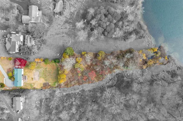 a view of a swimming pool with an outdoor space and seating area