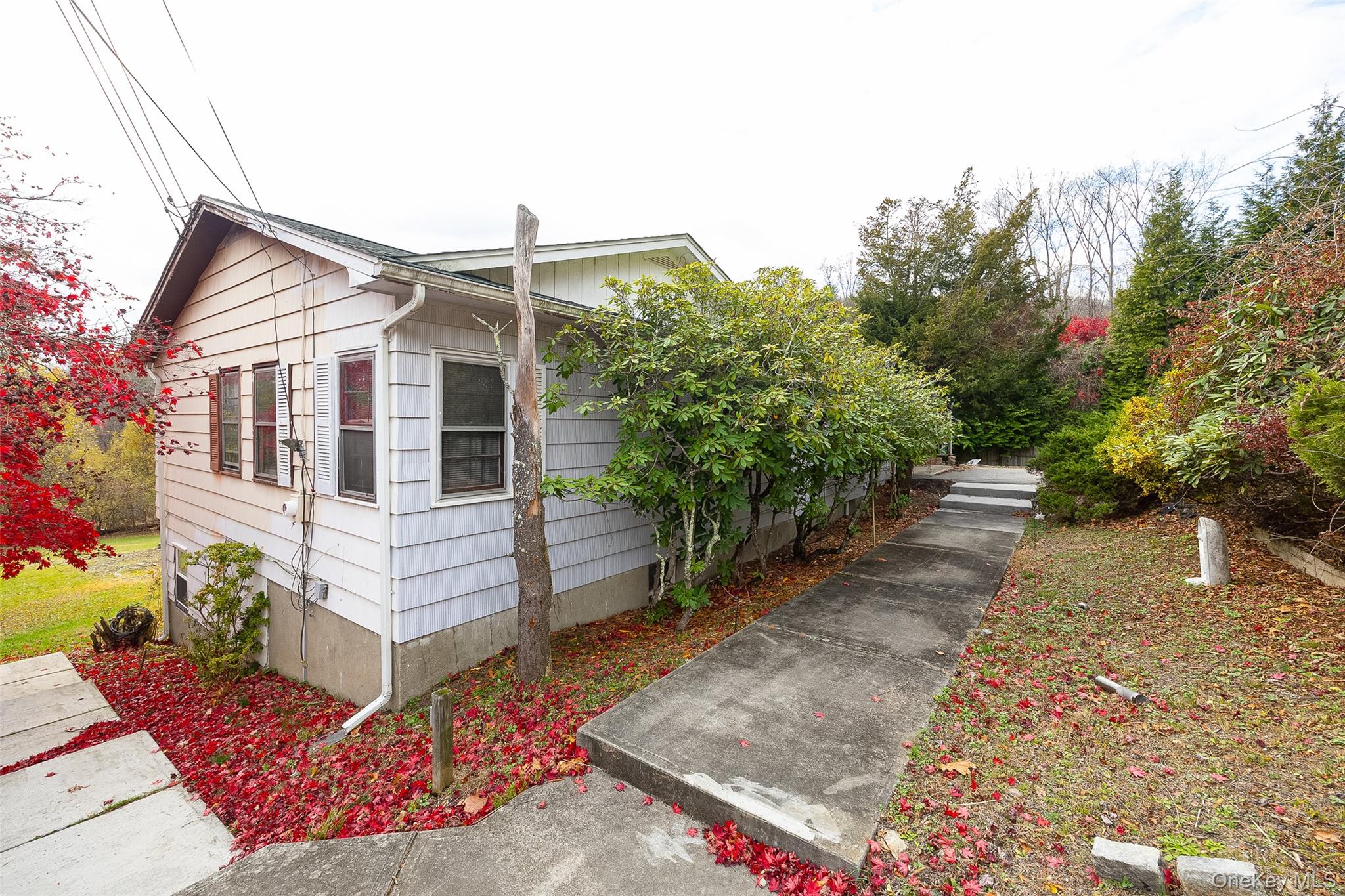 21 North Gate Road Carmel, NY 10512 - Photo 8 of 31 a front view of a house with a yard