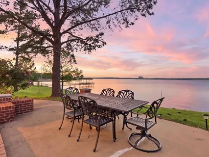 a view of a lake with a yard