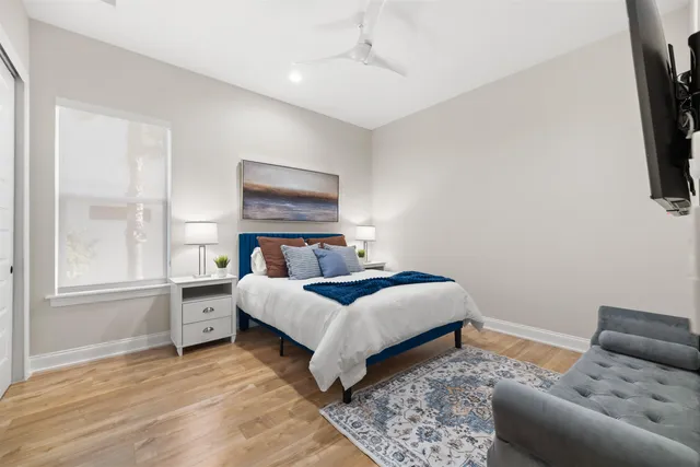 a bathroom with a sink a toilet and a shower