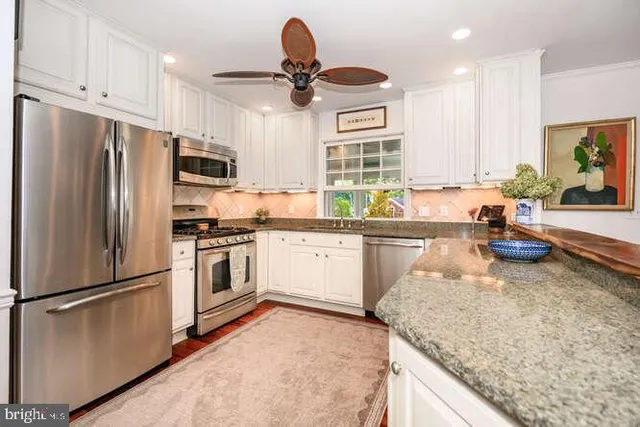 a view of a dining room with furniture