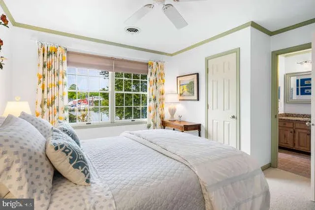 a bathroom with a tub and a shower