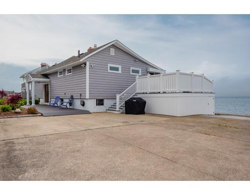 140 Fort Point Road Weymouth, MA 02191 - Photo 1 of 24 a view of large house with a yard and garage